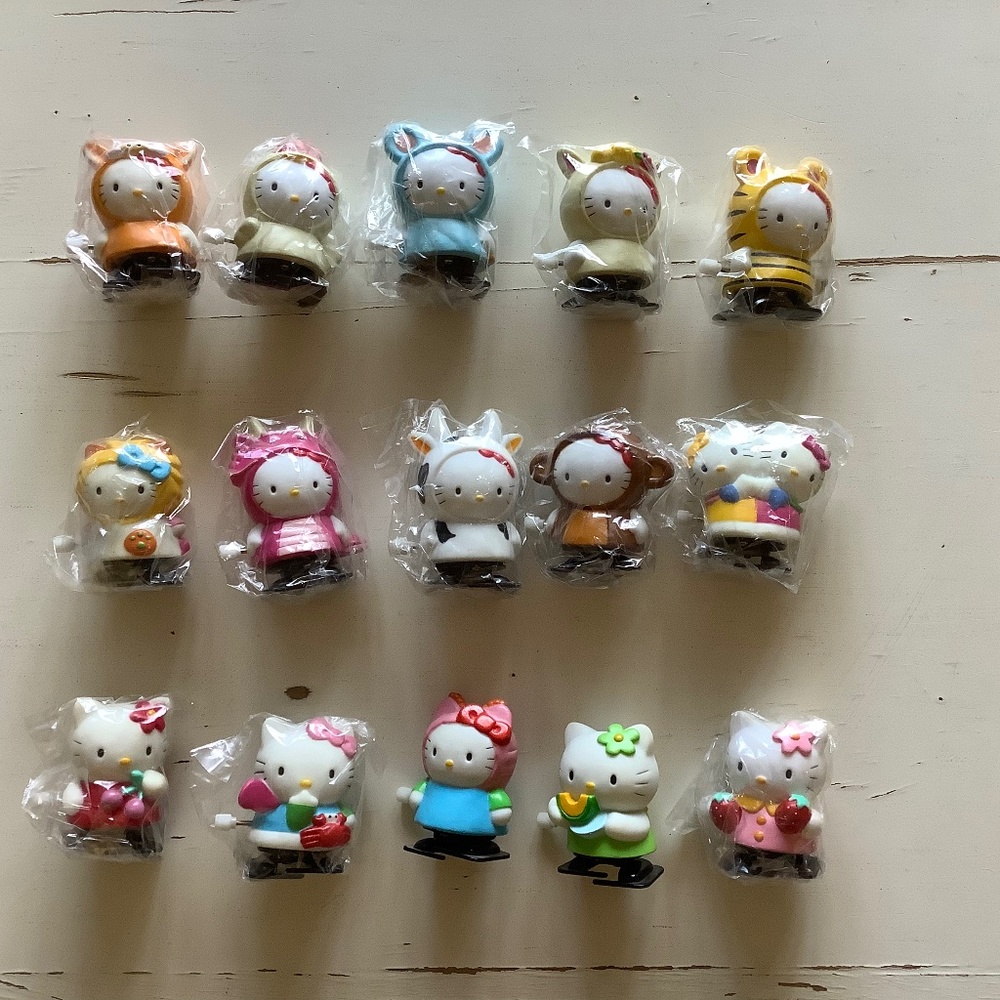 New in Package Hello Kitty wind up figurine toys